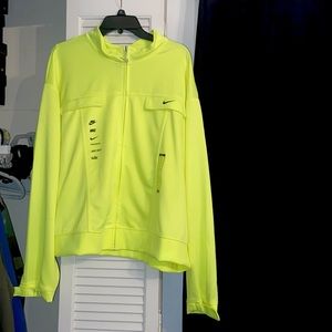 Woman’s neon Nike jacket.